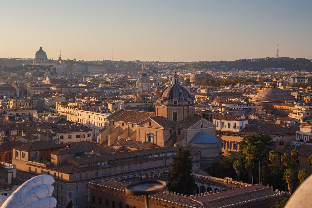 View from the roof of Monumento Nazionale a Vittorio Emanuele II with St. Peter's Basilica at the left and Patheop at the right.