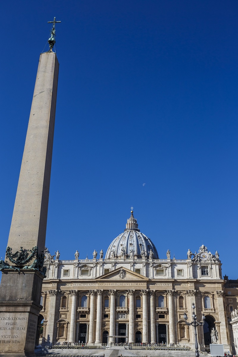 St Peters Basilica. Front view with a blue sky and the moon in the background